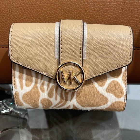 MICHAEL KORS
Carmen Medium Flap Bifold Faux Fur-Leather Wallet
Camel 
NWT - Picture 7 of 16